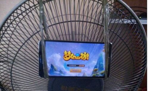 梦幻西游手游玩游戏手机烫怎么办